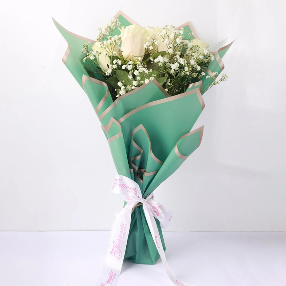 Refined Indulgence: Kaju Sweet with Elegant White Roses - Image 2