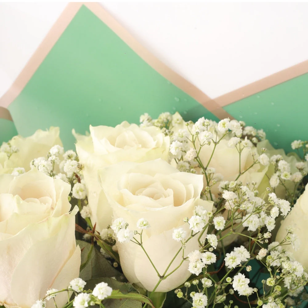 Refined Indulgence: Kaju Sweet with Elegant White Roses - Image 3