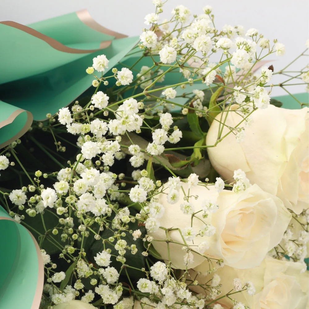Refined Indulgence: Kaju Sweet with Elegant White Roses - Image 4